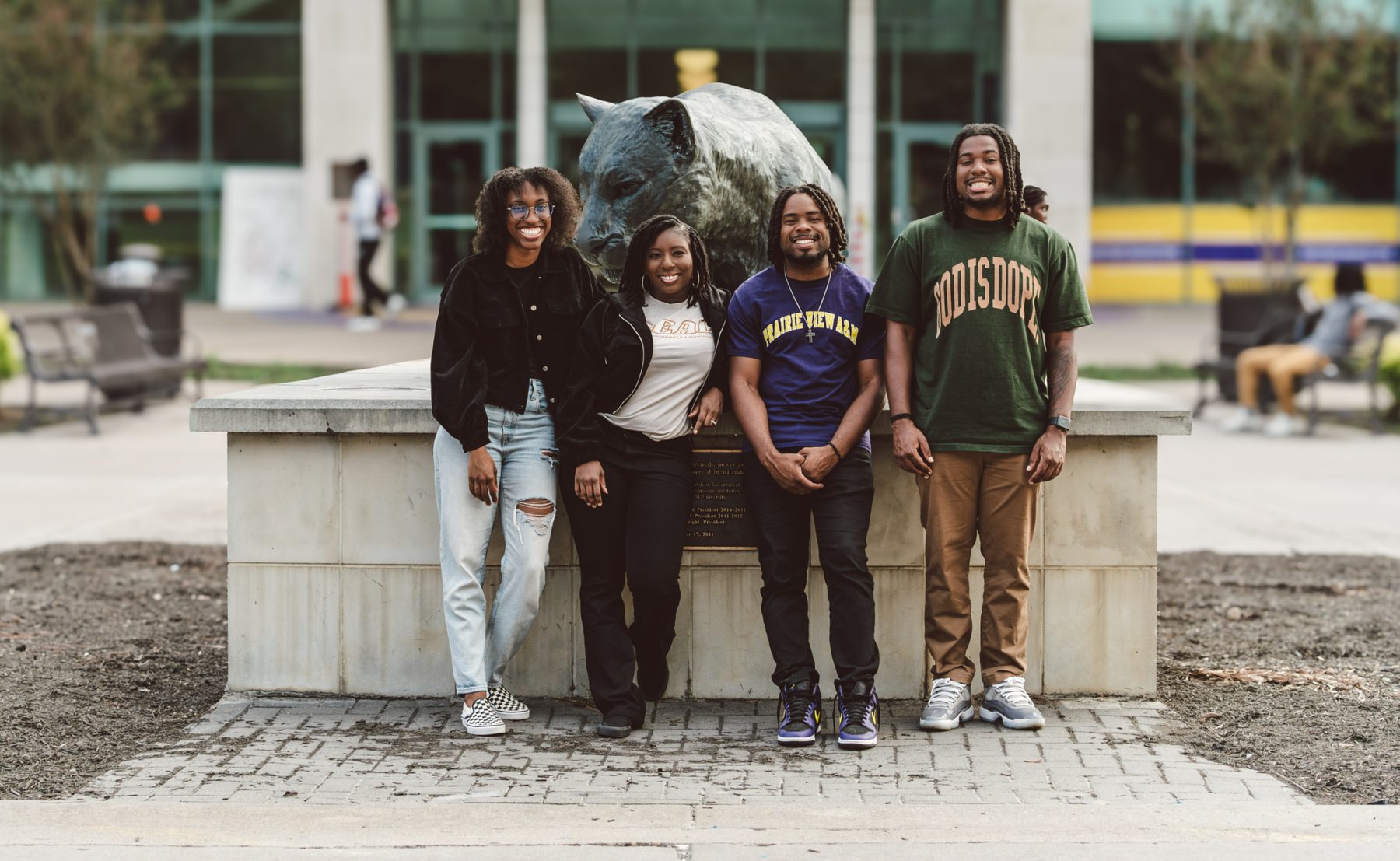 Sir James and Moriah with students